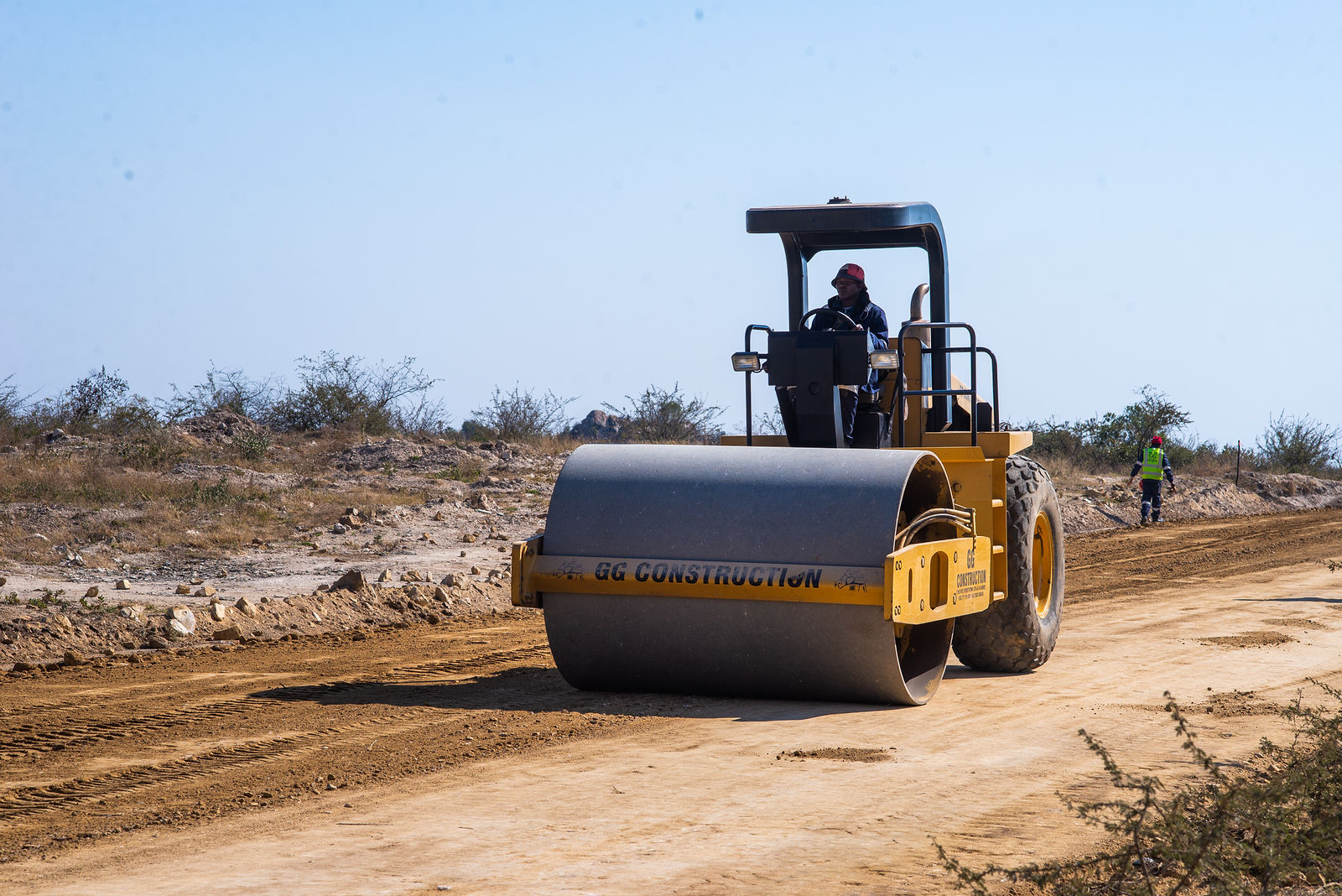 GG Construction roller compacting a new access road