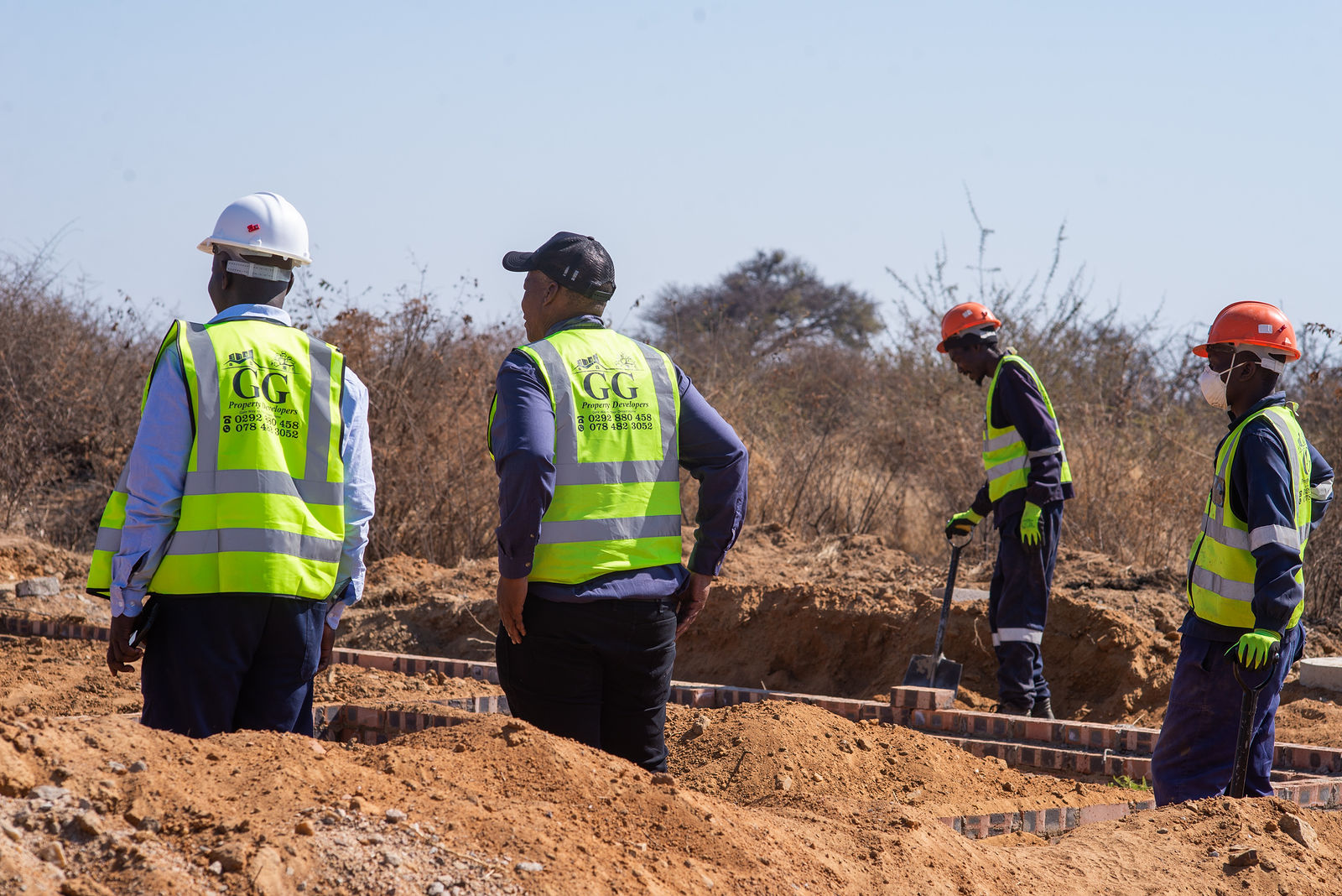 GG supervisors and crew inspecting foundation works