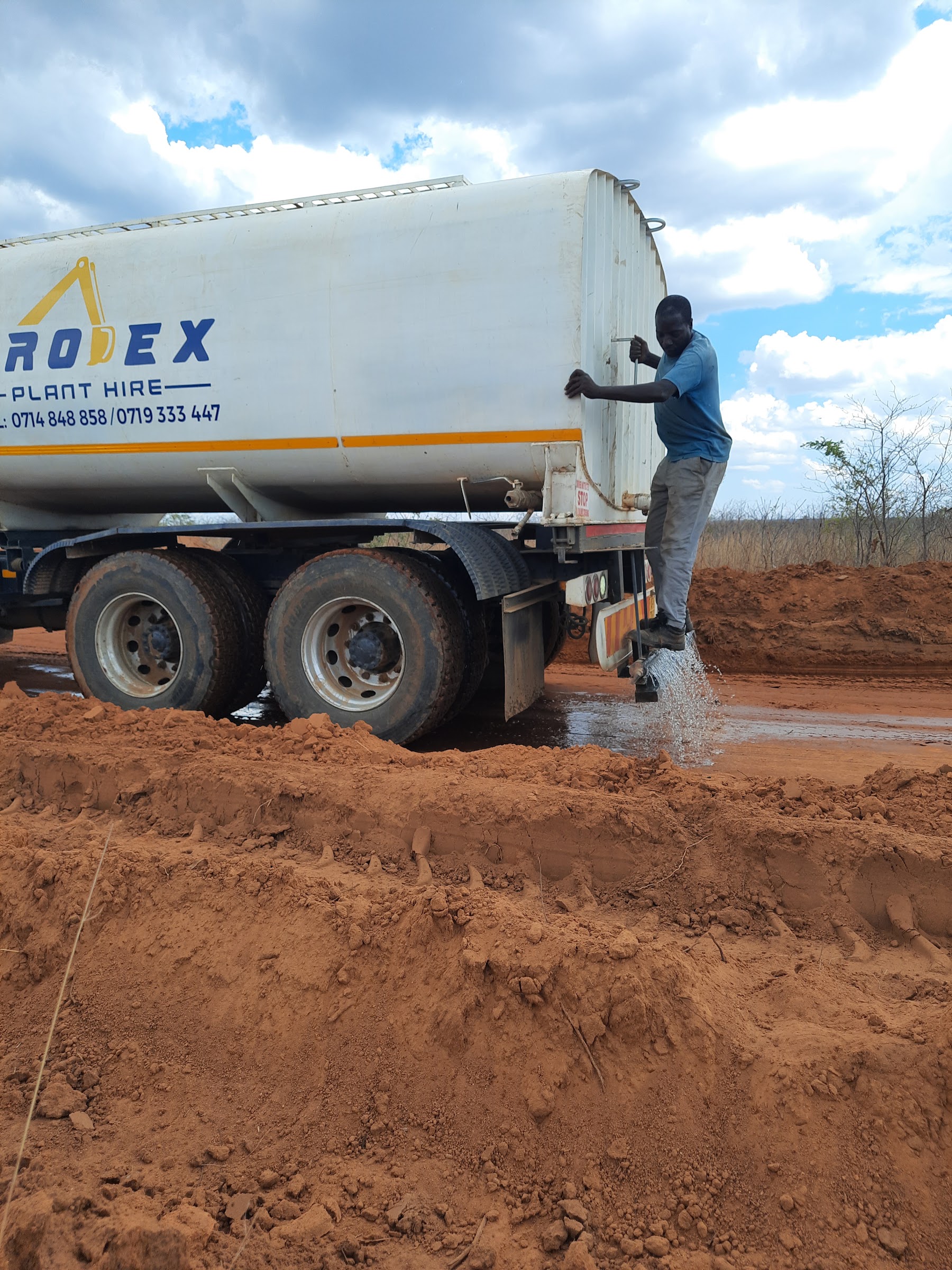 Tipper truck supporting earthworks on a formed access road